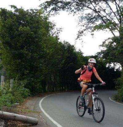Susan Lincoln Cycling on the  tour with redspokes